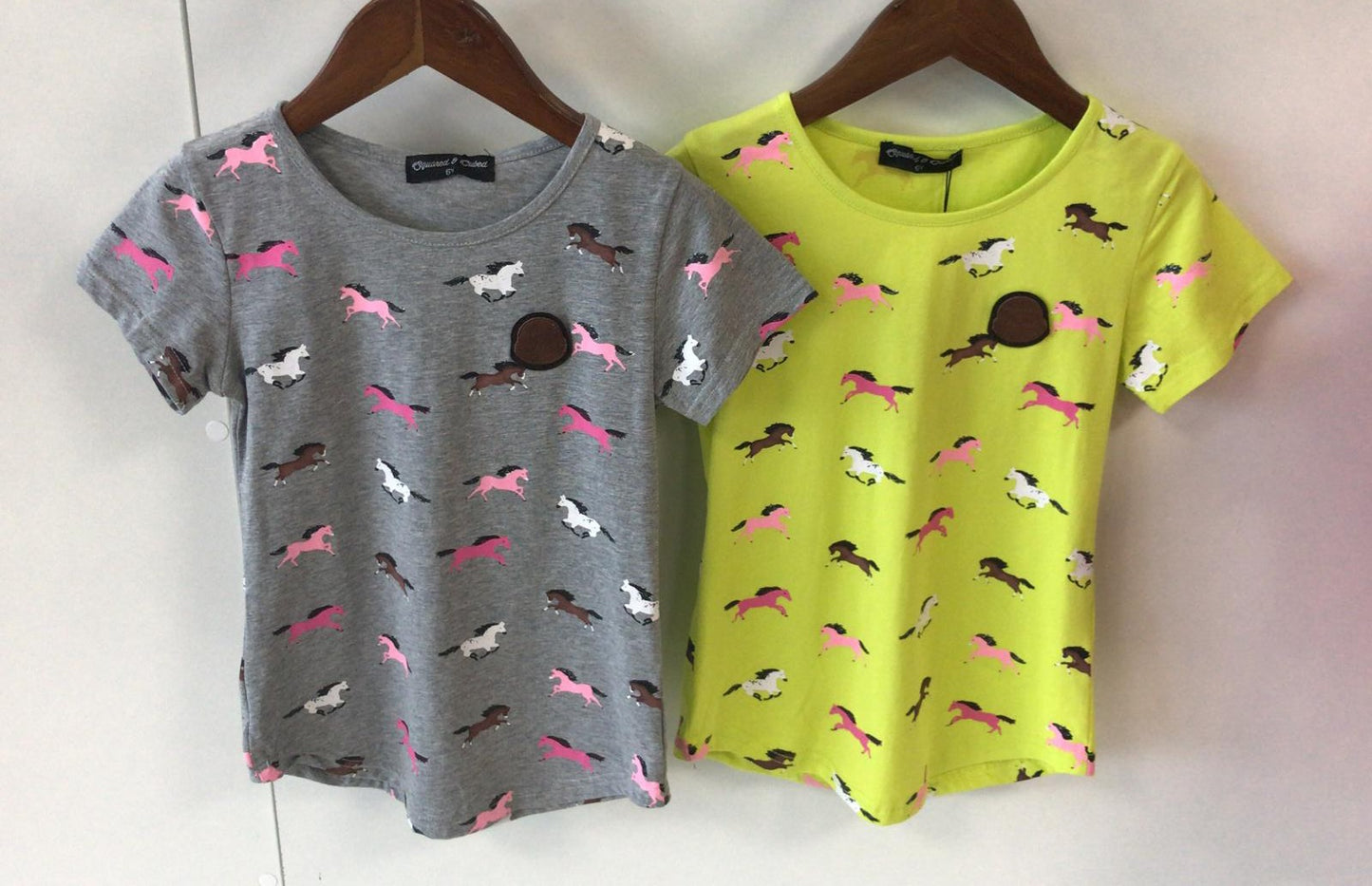 Gray shirt with all horses